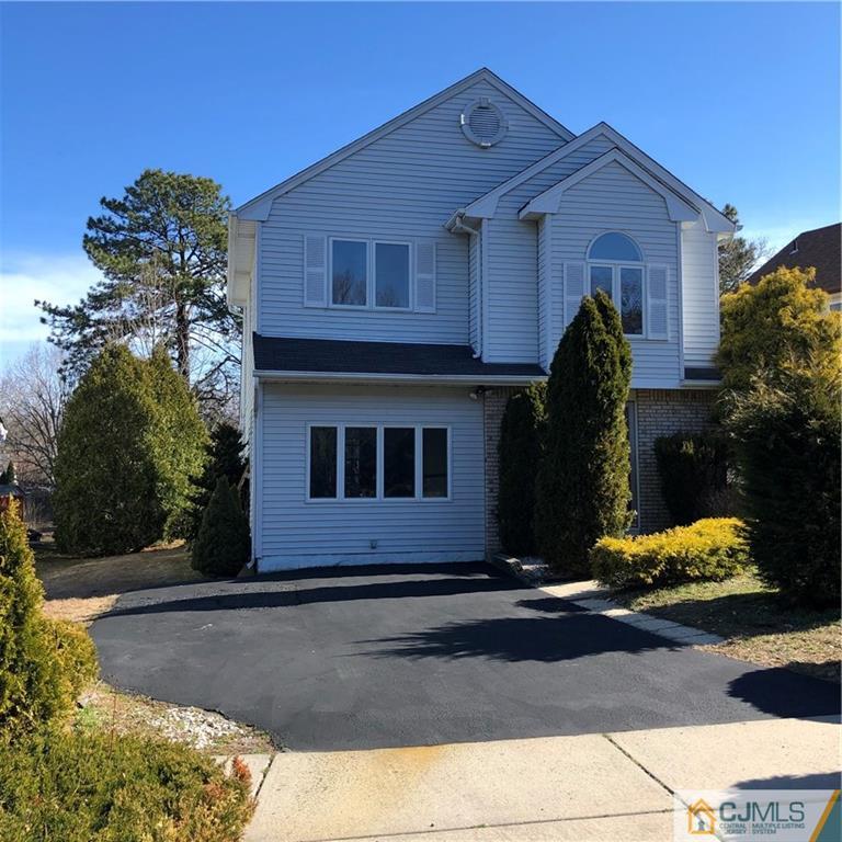16 Shelly Road Old Bridge, NJ 08857 - Photo 1 of 25 a house view with a garden space