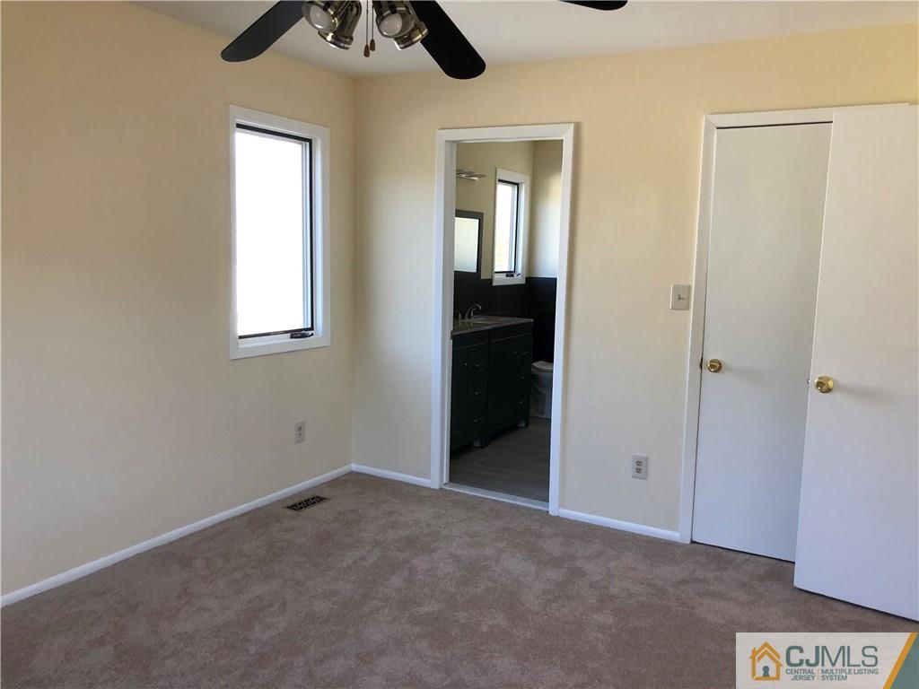 16 Shelly Road Old Bridge, NJ 08857 - Photo 13 of 25 an empty room that has a window