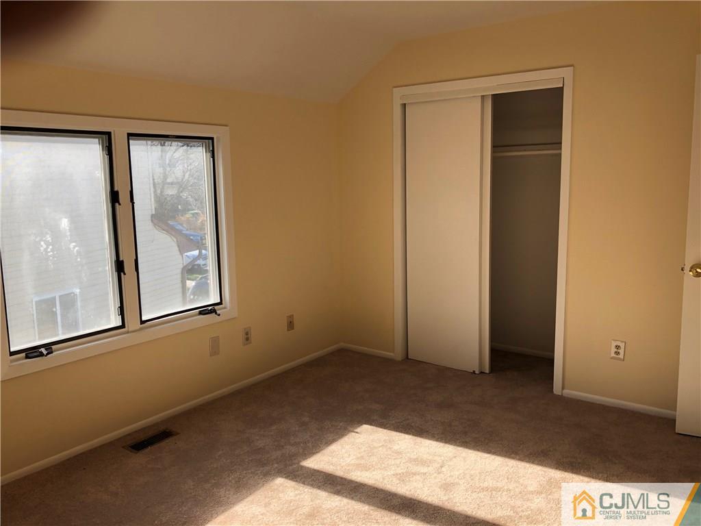 16 Shelly Road Old Bridge, NJ 08857 - Photo 15 of 25 an empty room with windows