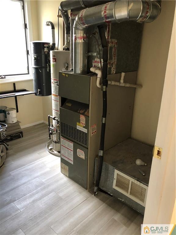 16 Shelly Road Old Bridge, NJ 08857 - Photo 25 of 25 a view of walk in closet with clothes and shoes