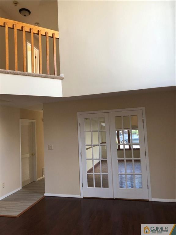 16 Shelly Road Old Bridge, NJ 08857 - Photo 9 of 25 a view of an empty room with wooden floor and a window
