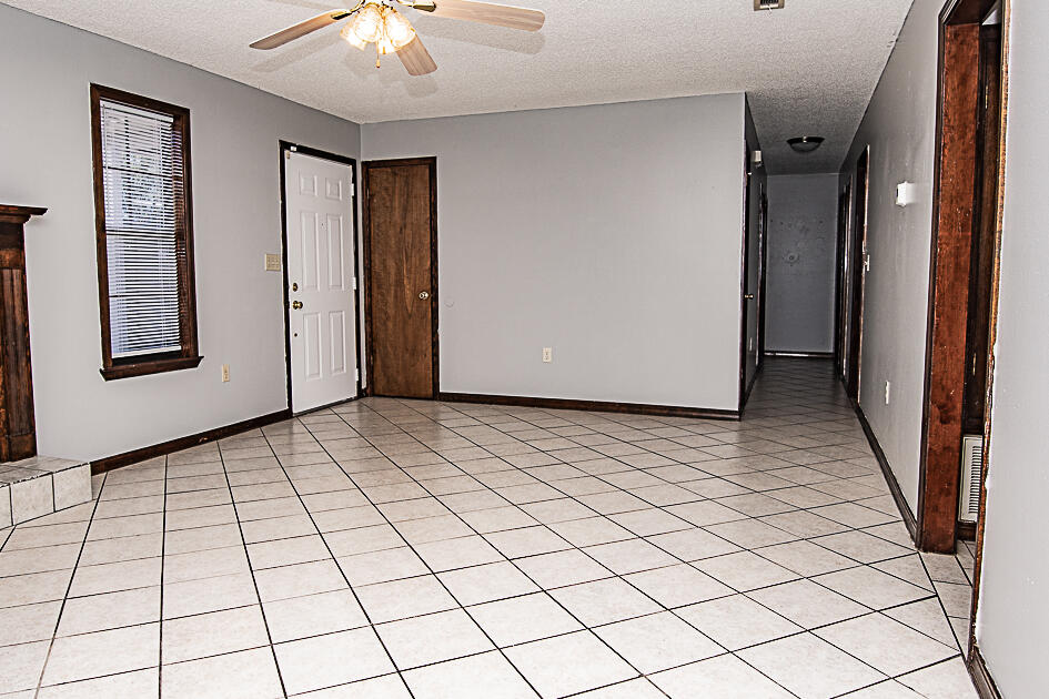 116 Walker Circle West Crestview, FL 32539 - Photo 3 of 20 a view of an empty room and window