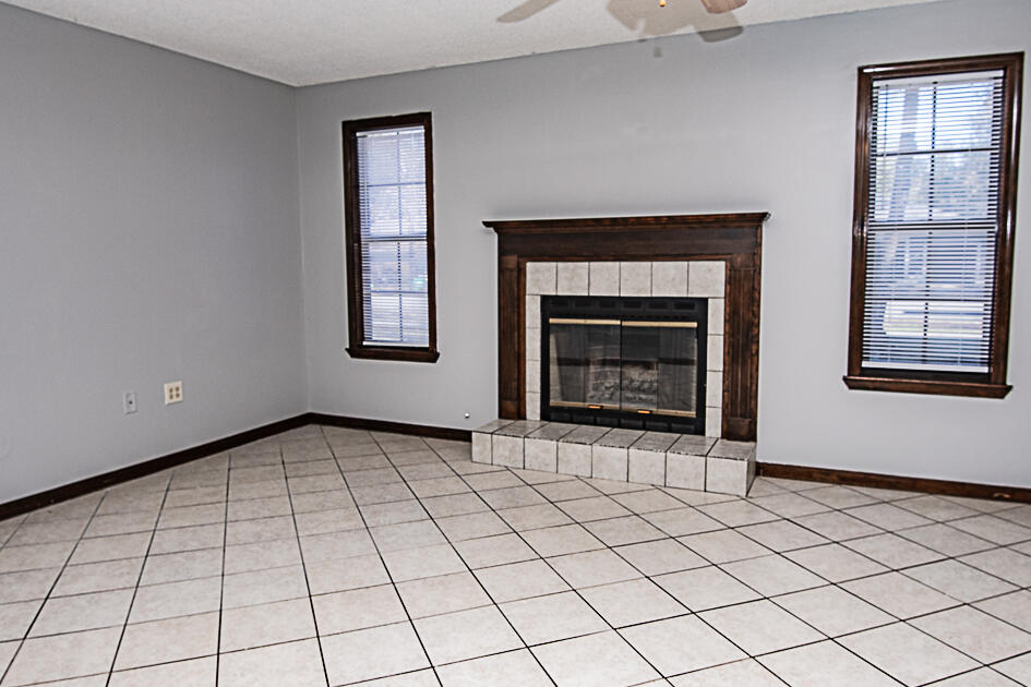 116 Walker Circle West Crestview, FL 32539 - Photo 5 of 20 an empty room with windows