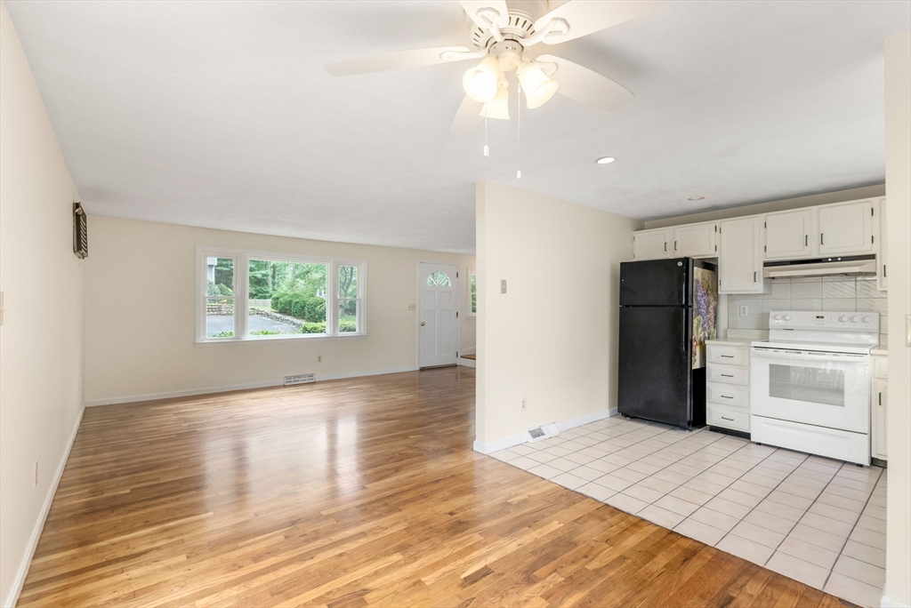 5 Old Central Turnpike Framingham, MA 01702 - Photo 20 of 32 wooden floor in an empty room with a kitchen