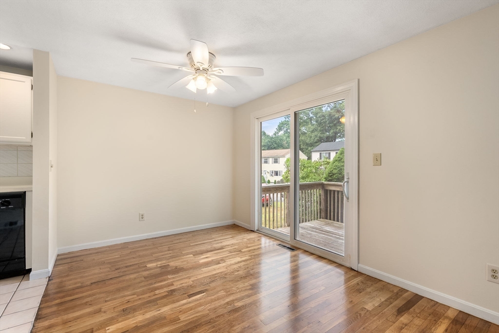 5 Old Central Turnpike Framingham, MA 01702 - Photo 22 of 32 a view of an empty room with wooden floor and a window