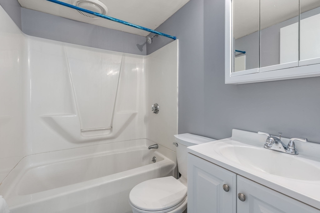 5 Old Central Turnpike Framingham, MA 01702 - Photo 28 of 32 a bathroom with a sink toilet and shower