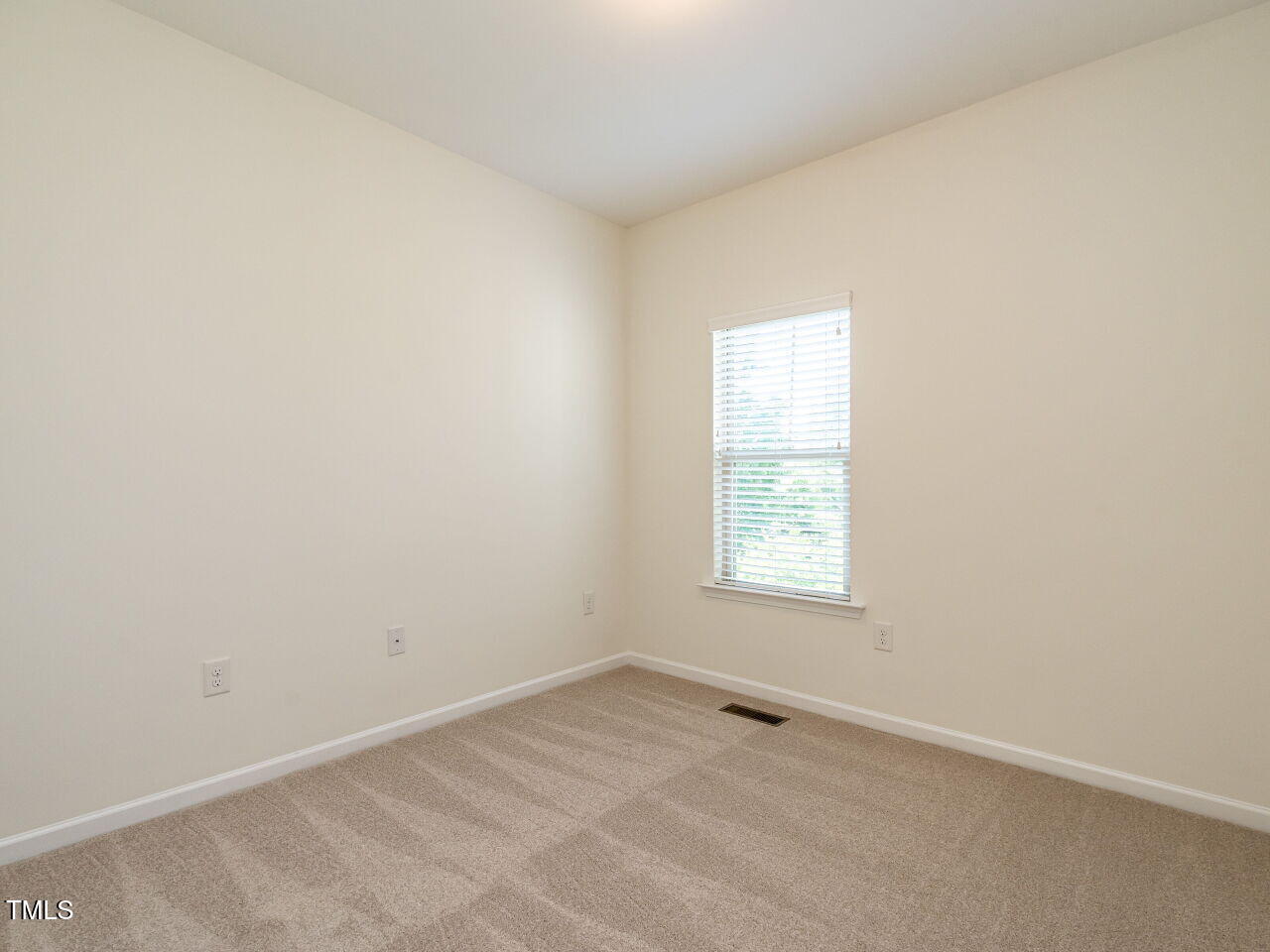 1314 Cornell Place Raleigh, NC 27607 - Photo 25 of 33 an empty room with a window