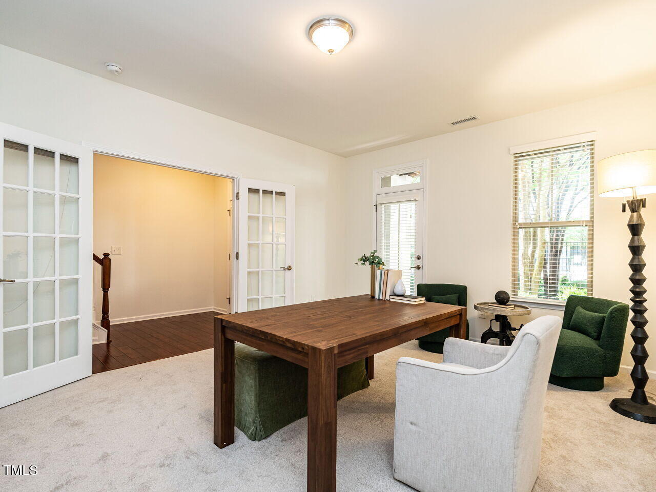 1314 Cornell Place Raleigh, NC 27607 - Photo 6 of 33 a living room with furniture a window and wooden floor