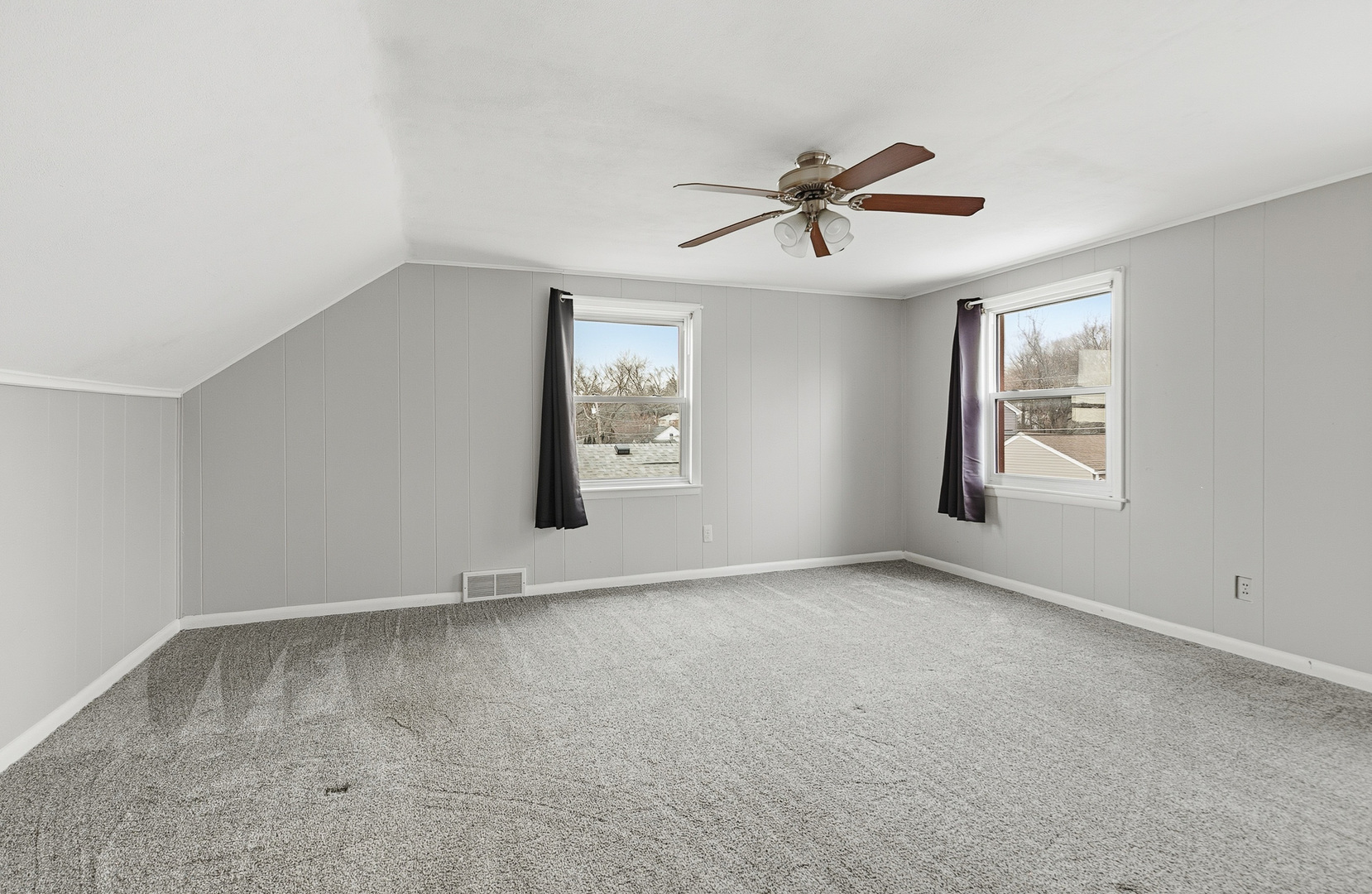 3237 12th Street Rock Island, IL 61201 - Photo 15 of 36 a view of an empty room with a window