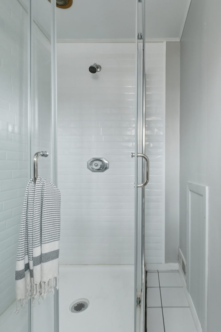 3237 12th Street Rock Island, IL 61201 - Photo 22 of 36 a bathroom with a shower