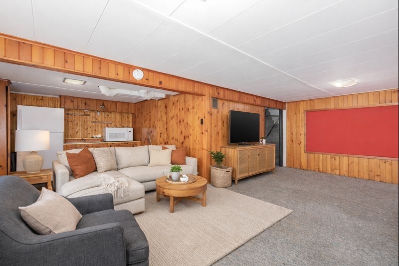 3237 12th Street Rock Island, IL 61201 - Photo 30 of 36 a living room with furniture and a flat screen tv
