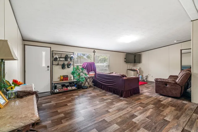 a living room with furniture window and couch