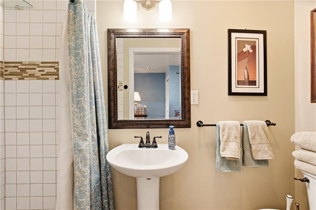 599 Brown Road Acme, PA 15610 - Photo 18 of 37 a bathroom with a sink and a mirror