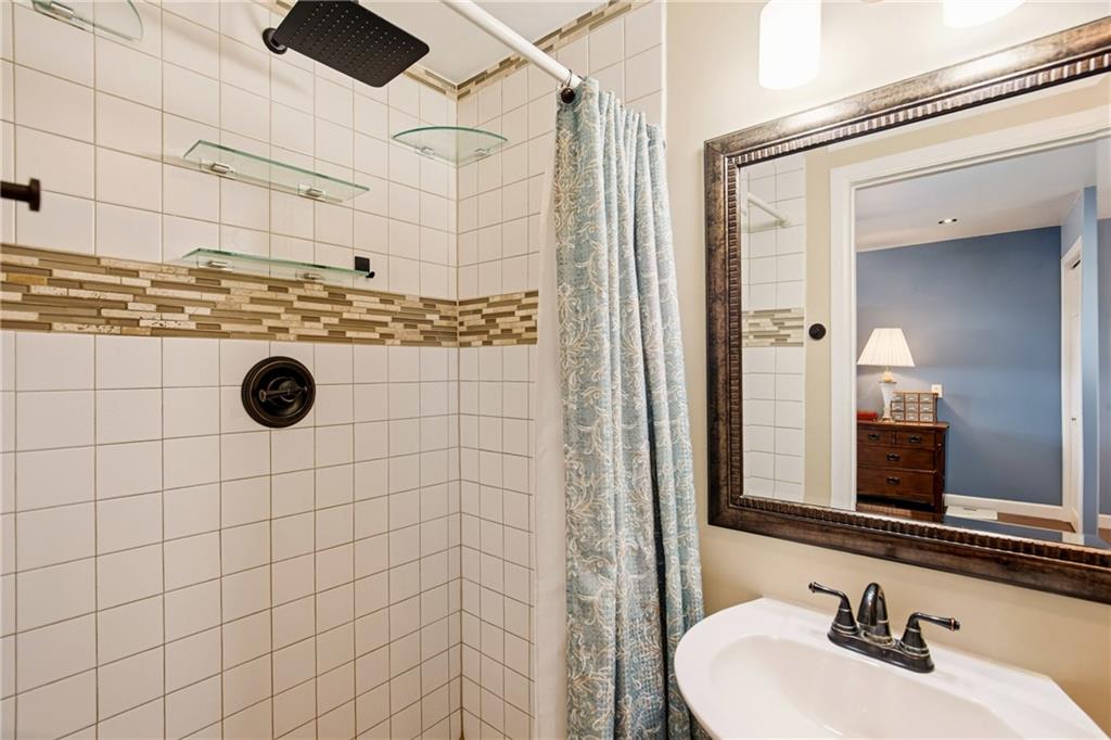 599 Brown Road Acme, PA 15610 - Photo 19 of 37 a bathroom with a sink and a mirror