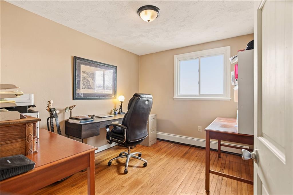 599 Brown Road Acme, PA 15610 - Photo 22 of 37 a view of a workspace with furniture and a window