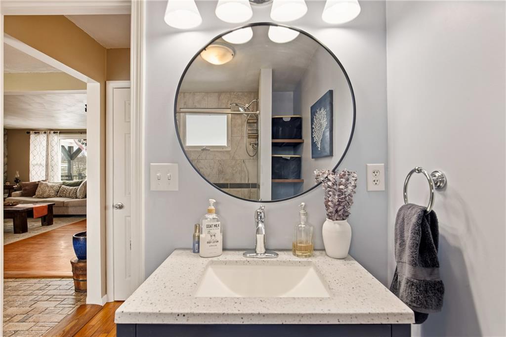 599 Brown Road Acme, PA 15610 - Photo 24 of 37 a bathroom with a sink and a mirror