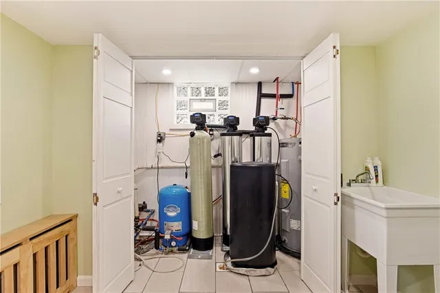 a view of a bathroom with a sink and mirror