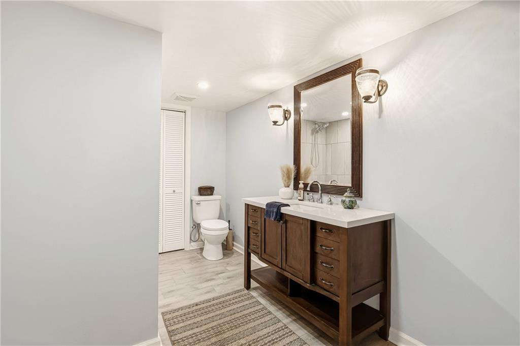599 Brown Road Acme, PA 15610 - Photo 31 of 37 a view of a bathroom with a sink and mirror