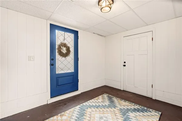a view of an entryway with a flower pot
