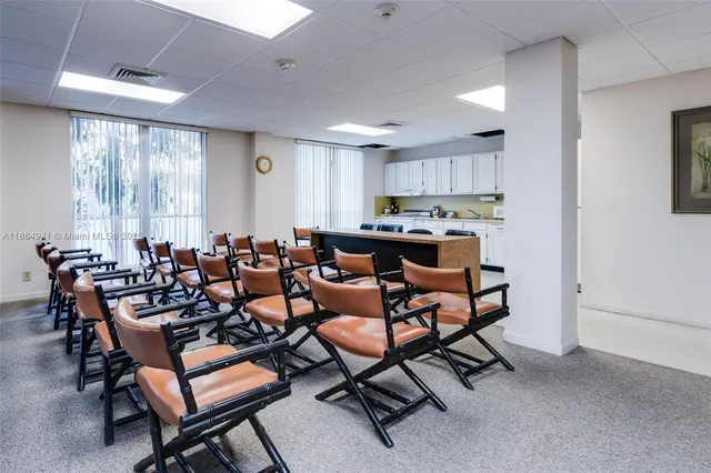 a view of a livingroom with furniture and furniture