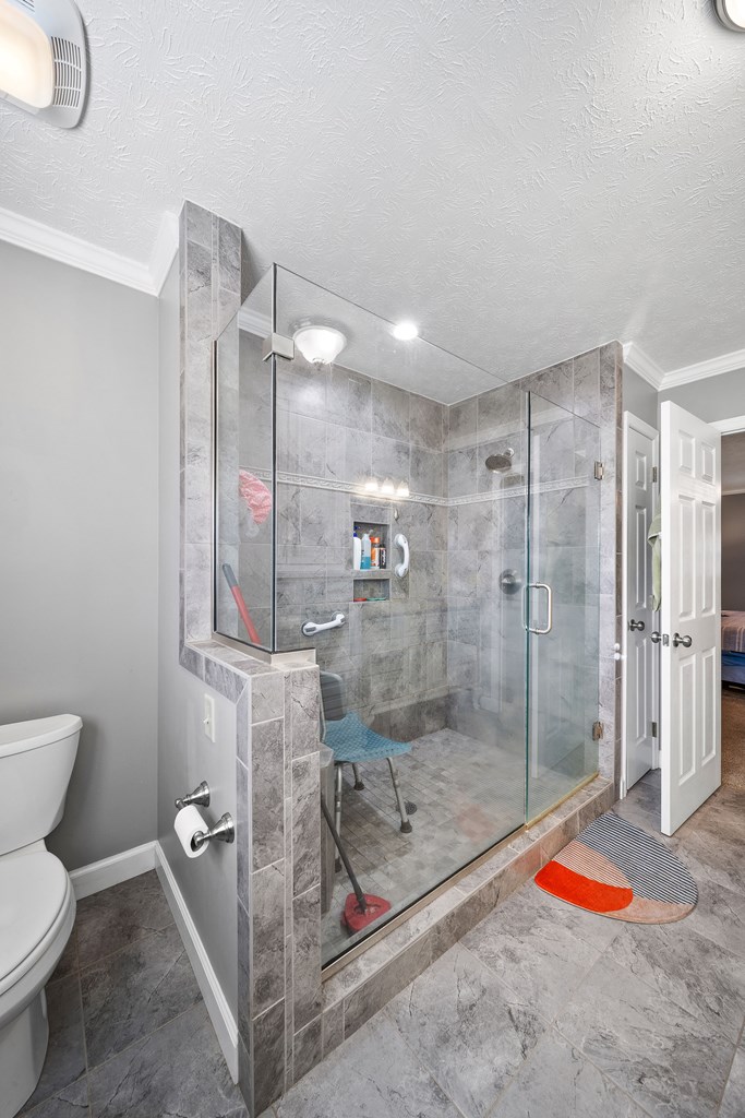 4300 Green Road Ellaville, GA 31806 - Photo 18 of 41 a bathroom with a shower and toilet