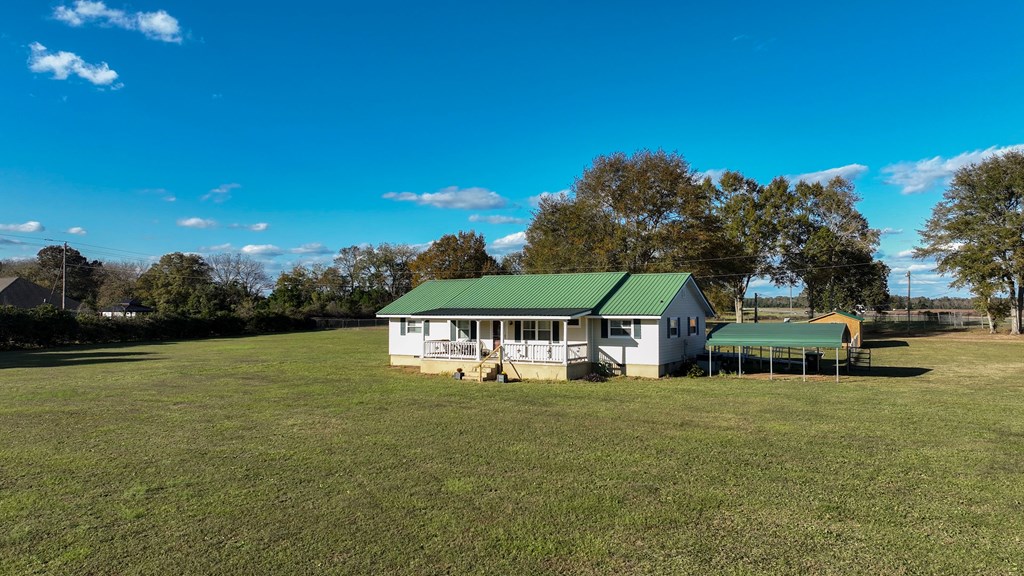 4300 Green Road Ellaville, GA 31806 - Photo 33 of 41 a front view of a house with garden