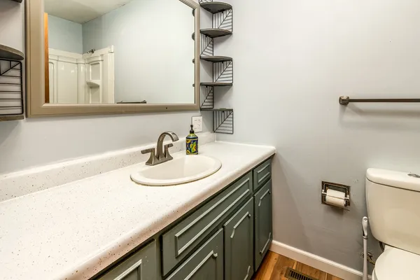 a white bath tub sitting next to a white toilet
