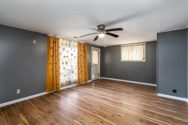 a view of entryway with wooden floor