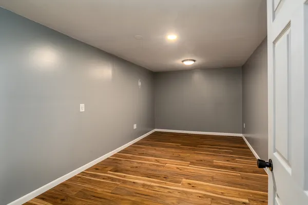 a view of an empty room with a garage
