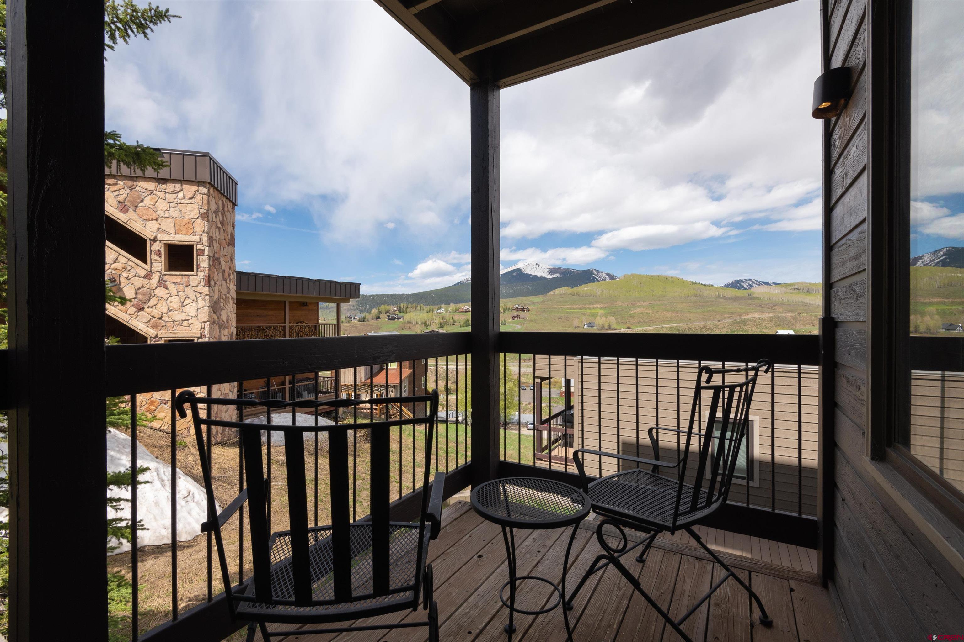 33 Castle Road, Unit 3 Crested Butte, CO 81225 - Photo 12 of 34 a view of a chairs and table in patio