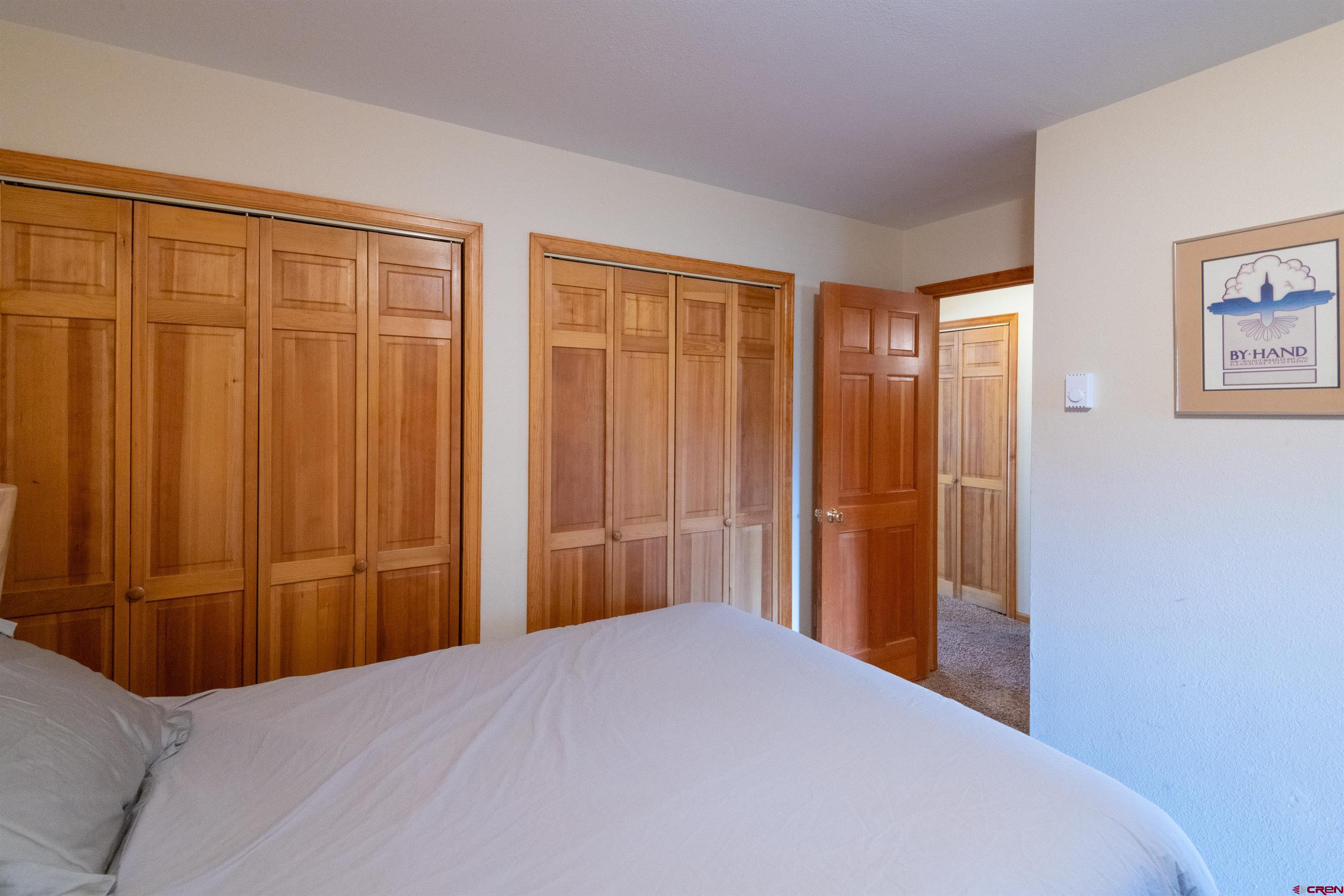 33 Castle Road, Unit 3 Crested Butte, CO 81225 - Photo 24 of 34 a bedroom with a bed and a closet