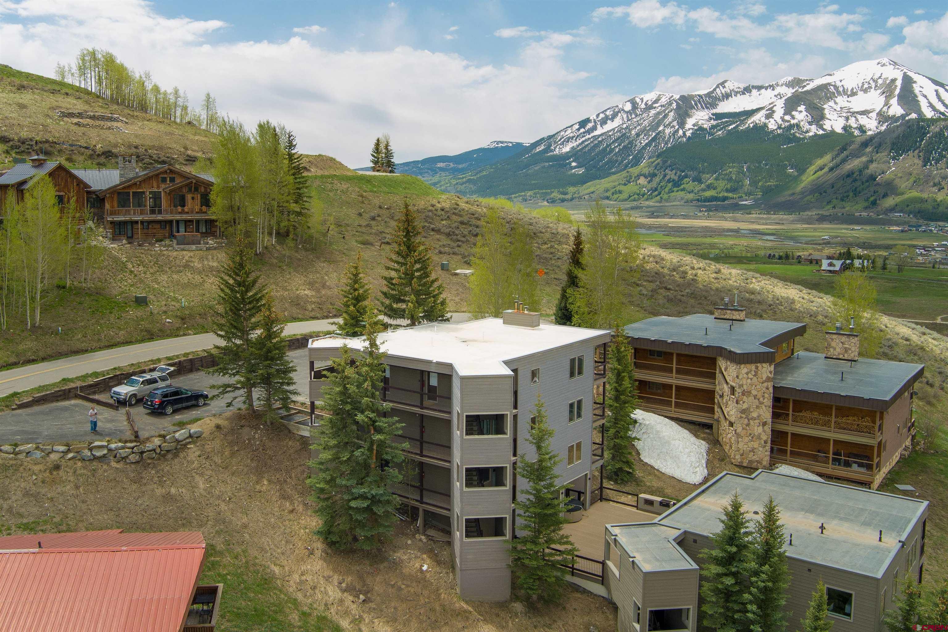 33 Castle Road, Unit 3 Crested Butte, CO 81225 - Photo 33 of 34 an aerial view of a house with a lake view