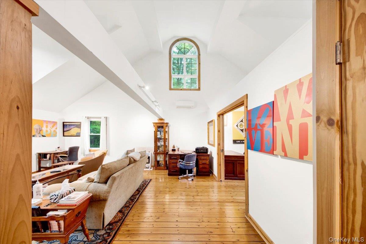 161 Goldens Bridge Road Katonah, NY 10536 - Photo 13 of 44 a living room with furniture and a large window