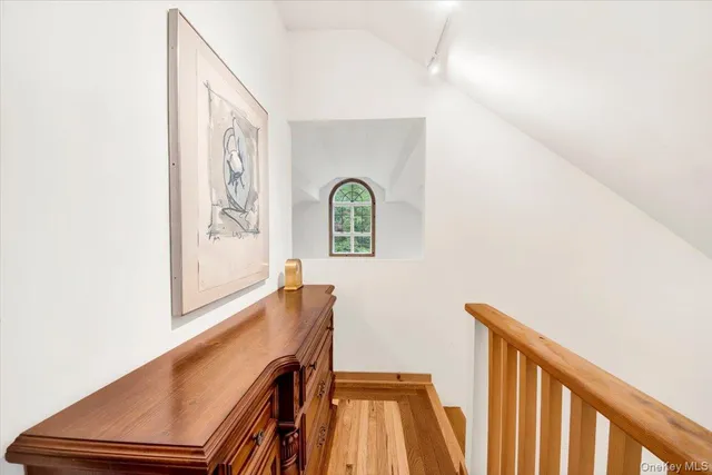 a bed room with a bed and a tv