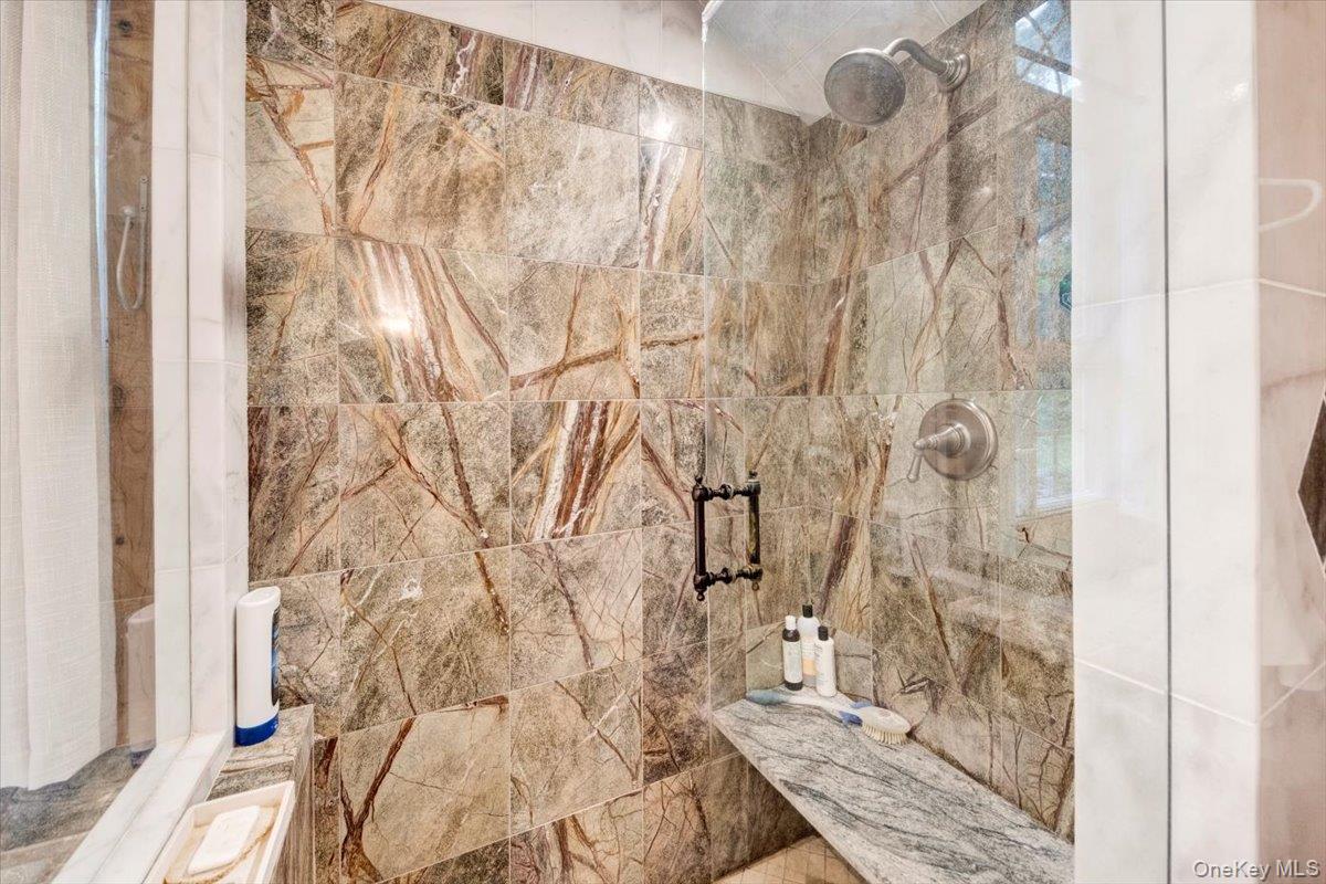 161 Goldens Bridge Road Katonah, NY 10536 - Photo 24 of 44 a bathroom with a granite countertop shower and a mirror