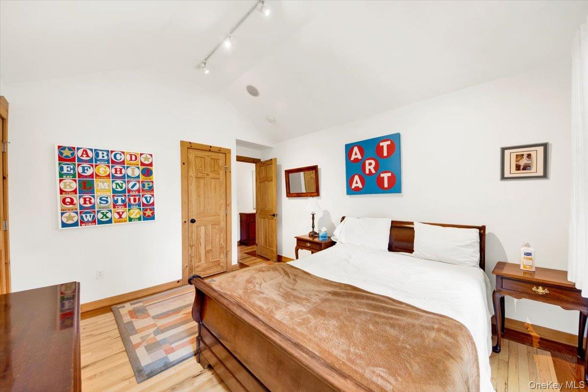 161 Goldens Bridge Road Katonah, NY 10536 - Photo 25 of 44 a bedroom with a bed and a desk