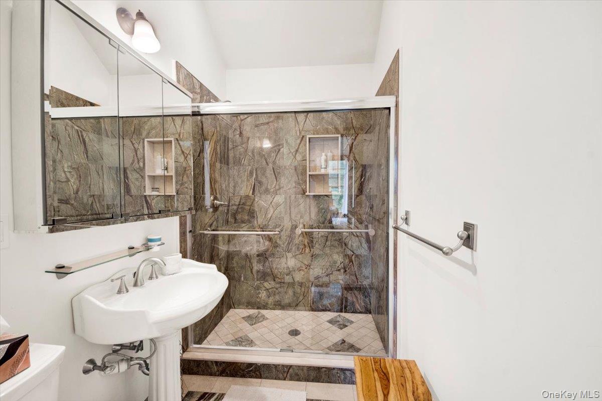 161 Goldens Bridge Road Katonah, NY 10536 - Photo 27 of 44 a bathroom with a sink and mirror
