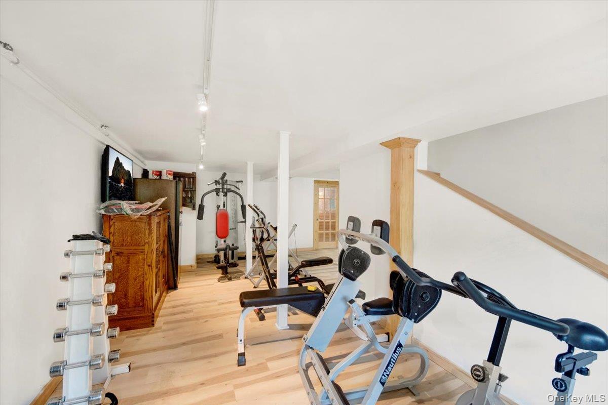 161 Goldens Bridge Road Katonah, NY 10536 - Photo 32 of 44 a view of a room with gym equipment