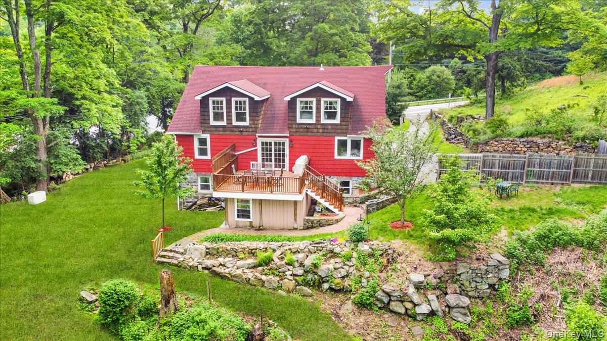 161 Goldens Bridge Road Katonah, NY 10536 - Photo 36 of 44 a front view of house with yard and trees