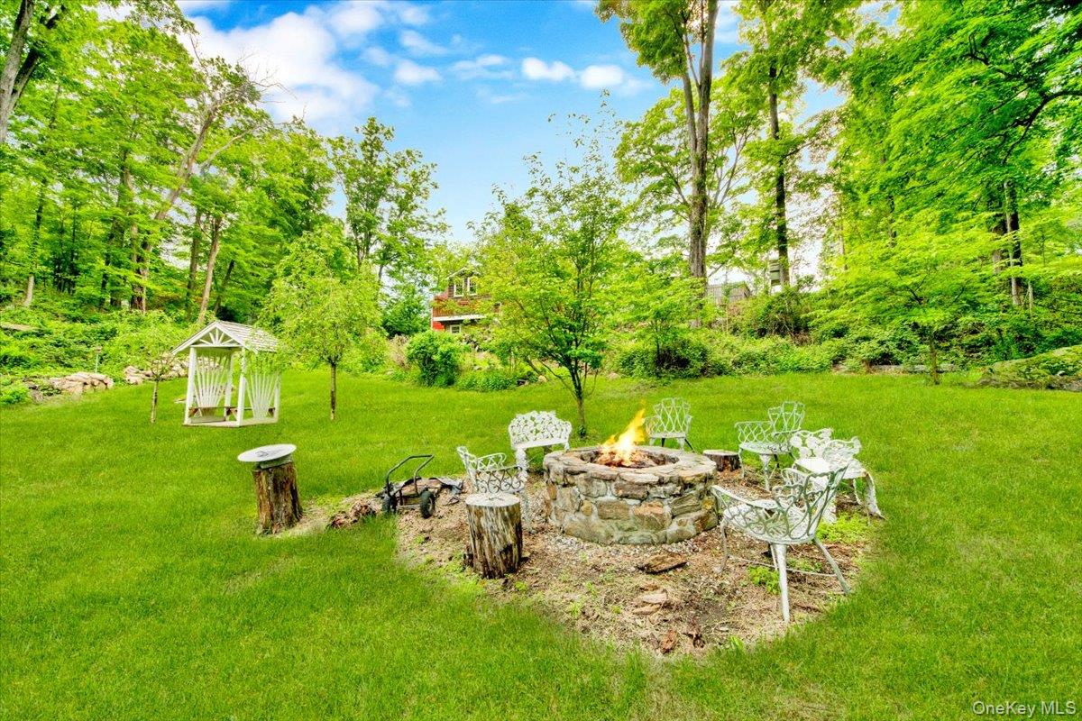 161 Goldens Bridge Road Katonah, NY 10536 - Photo 37 of 44 a garden view with a sitting space