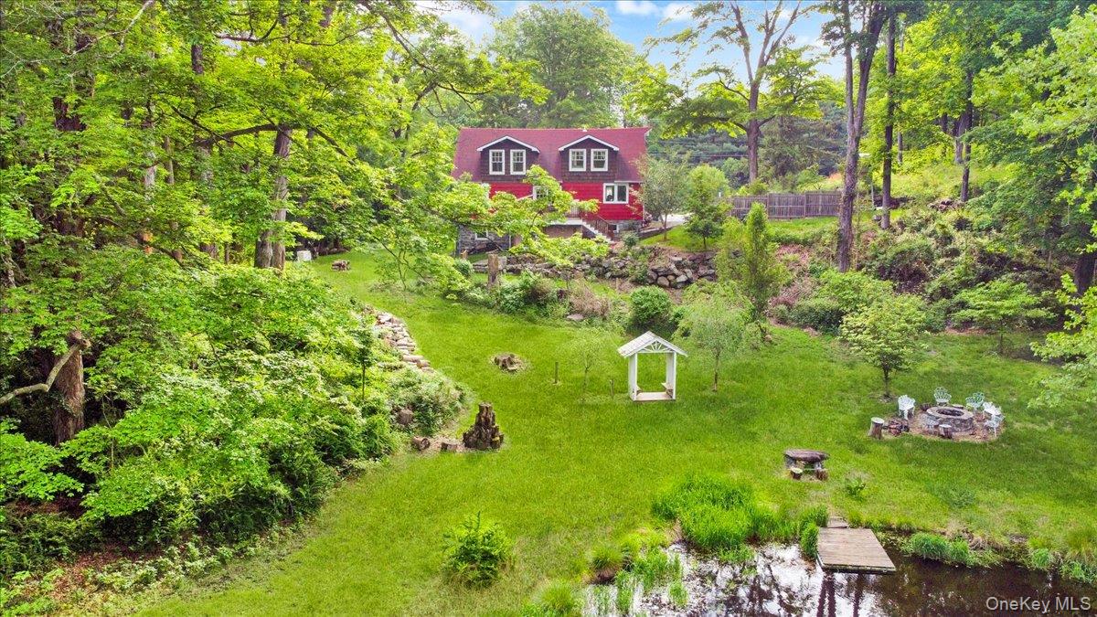 161 Goldens Bridge Road Katonah, NY 10536 - Photo 38 of 44 a sign that is sitting in a yard