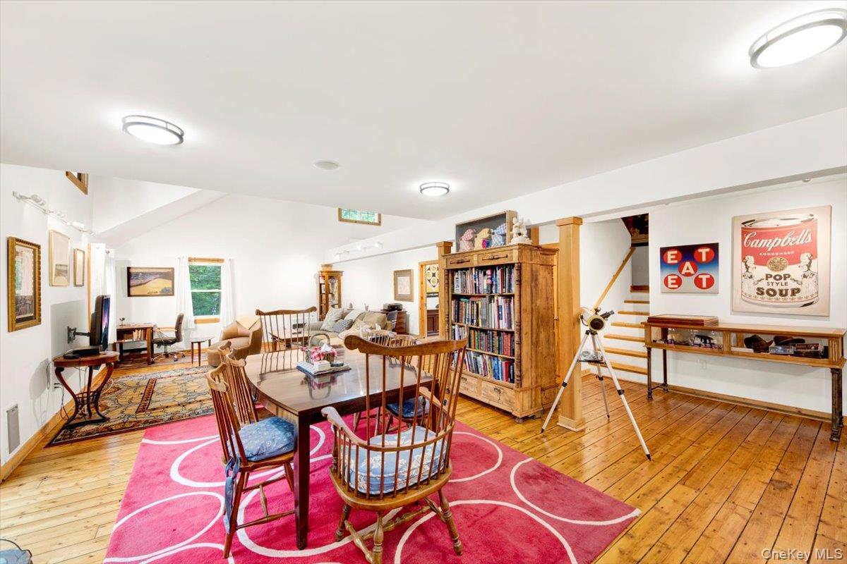 161 Goldens Bridge Road Katonah, NY 10536 - Photo 7 of 44 a living room with lots of furniture and wooden floor