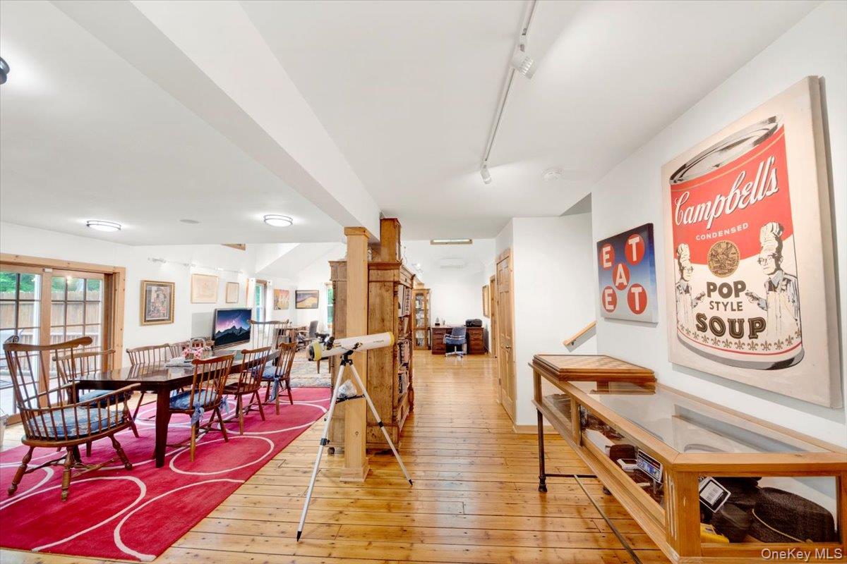161 Goldens Bridge Road Katonah, NY 10536 - Photo 8 of 44 a living room with lots of furniture and kitchen view