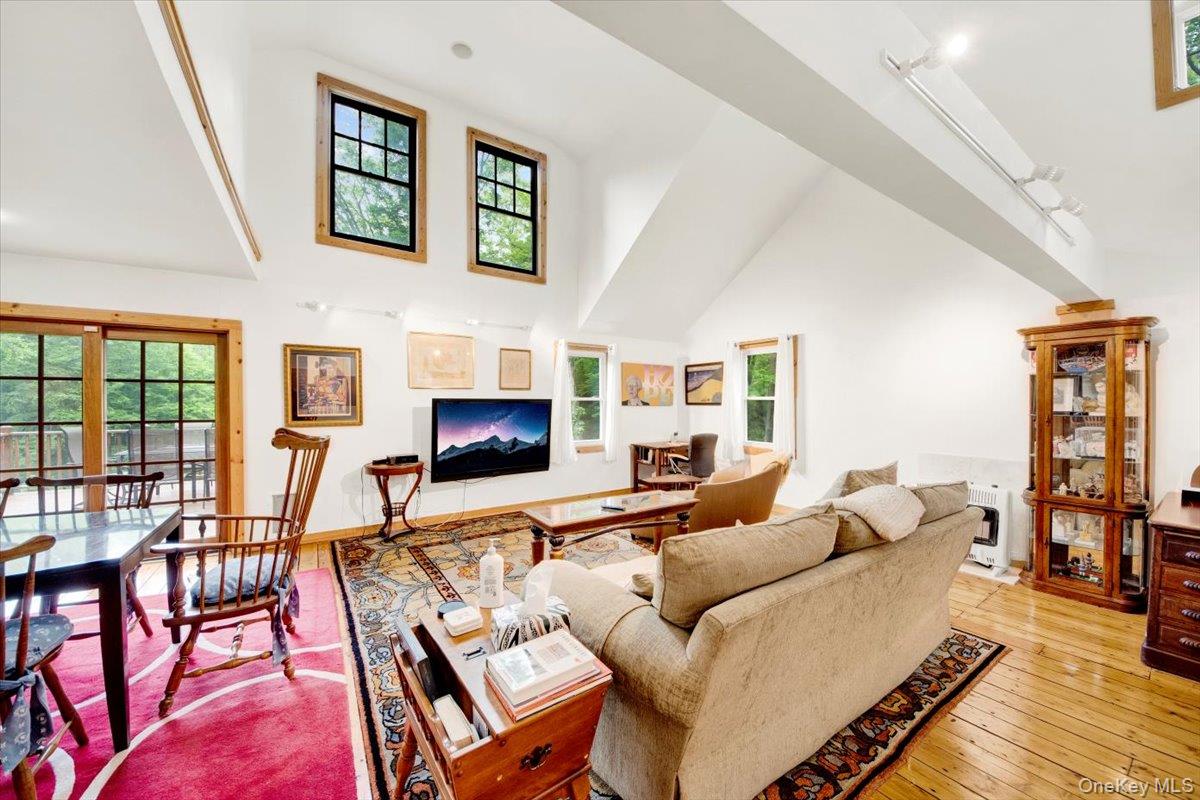 161 Goldens Bridge Road Katonah, NY 10536 - Photo 10 of 44 a living room with furniture and a fireplace