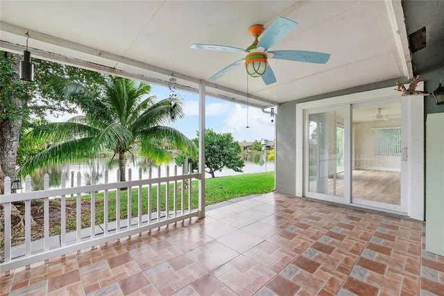a view of a porch with a backyard