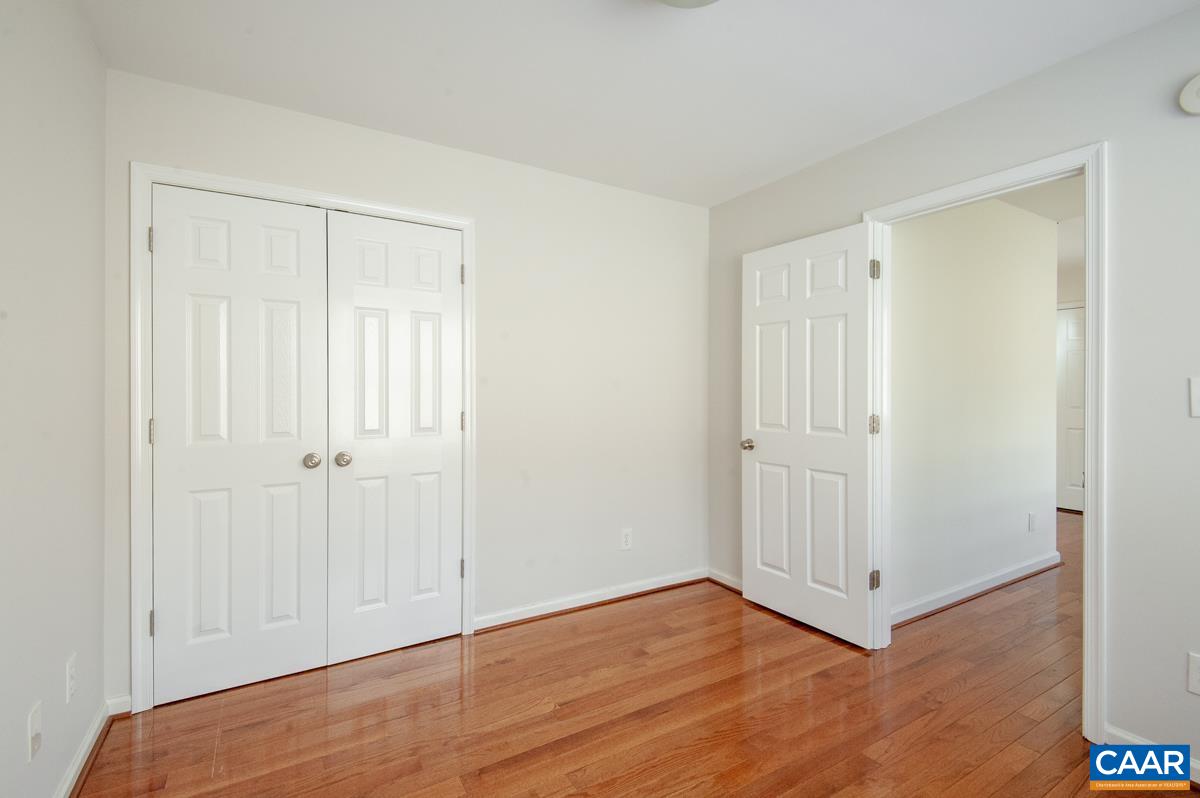 345 Quarry Road Charlottesville, VA 22902 - Photo 21 of 32 a view of hallway with wooden floor