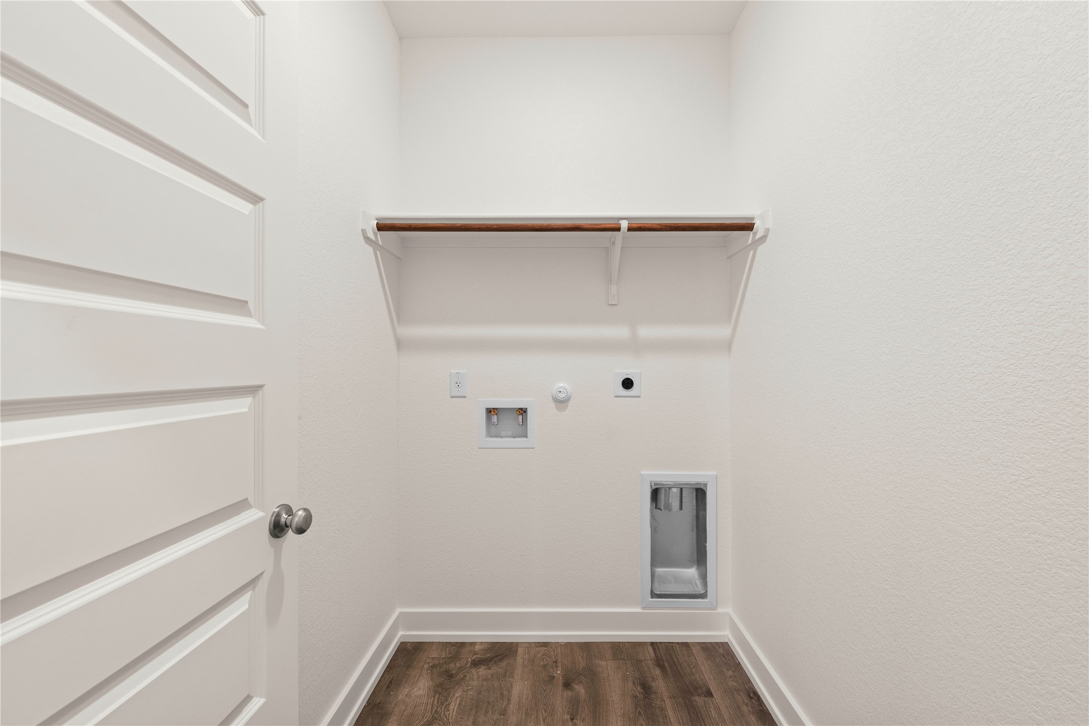 552 Gus Loop Georgetown, TX 78626 - Photo 22 of 23 a view of walk in closet with empty racks