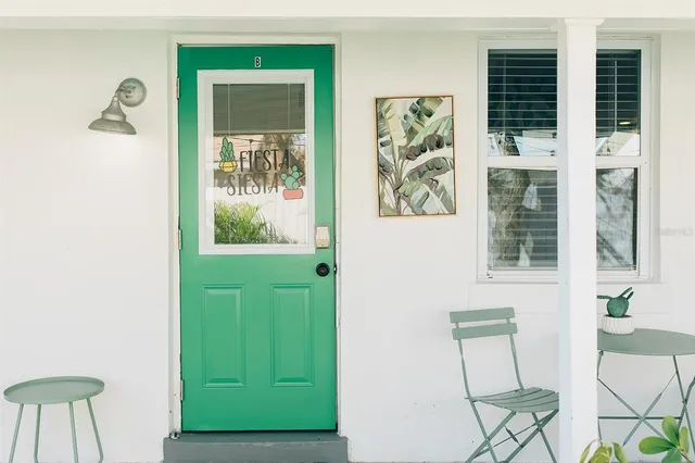 a front view of a house with a backyard