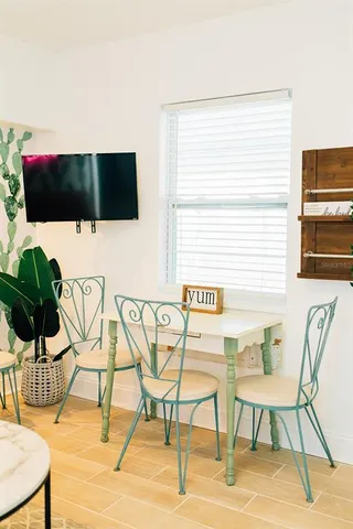 a view of a living room and a kitchen