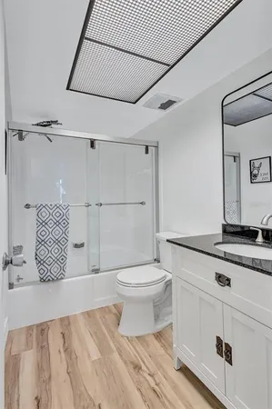 a bathroom with a toilet and a sink
